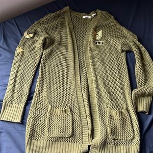 Worn army green military style cardigan.